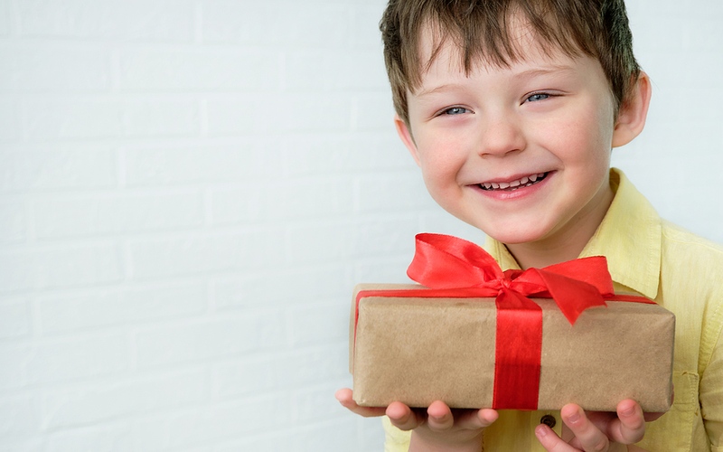 Boy Holding Birthday Present